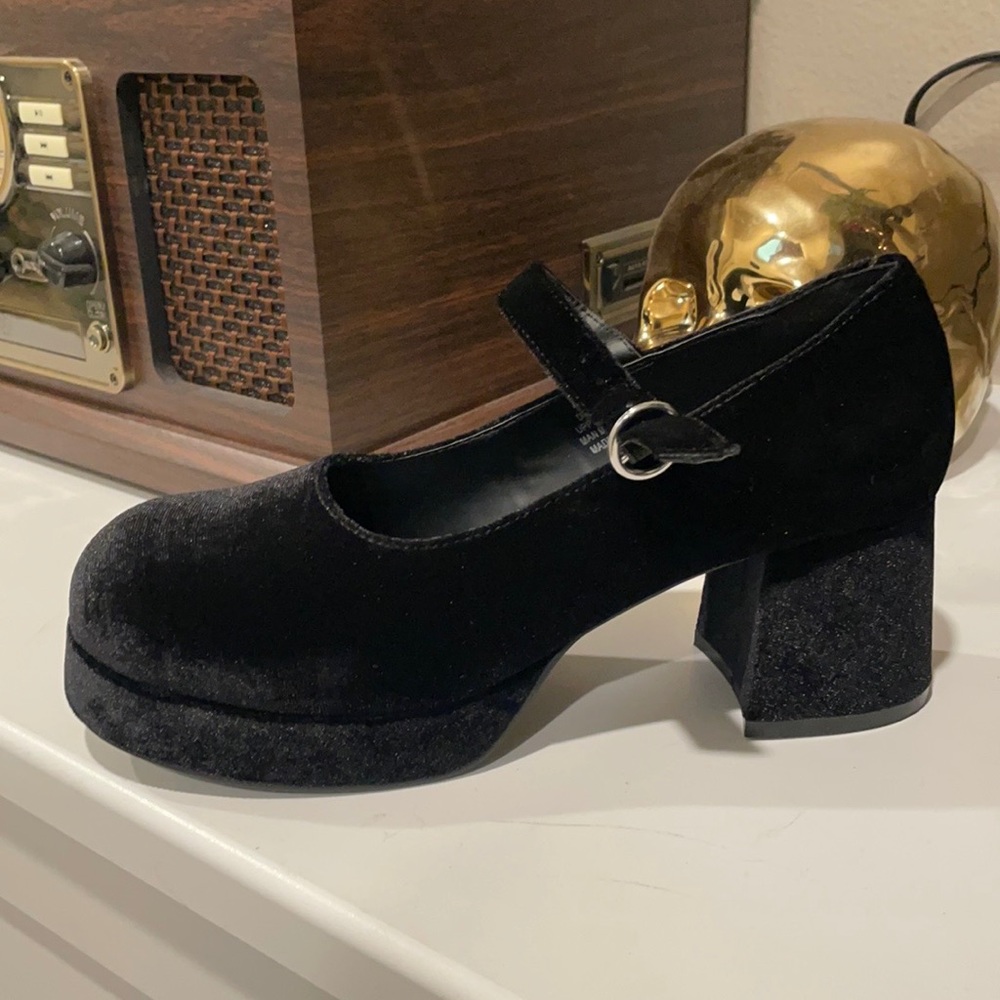Black velvet platforms.
